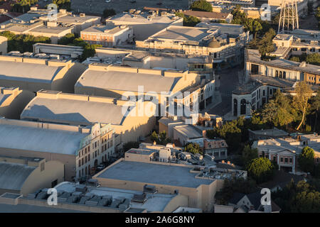 Burbank, California, USA - October 25, 2019:  Morning aerial view of sound stages and back lot buildings at the Warner Bros studio lot near Los Angele Stock Photo