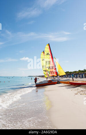 Happy tourists kayaking in the transparent water of Caribbean, Varadero, Cuba Stock Photo