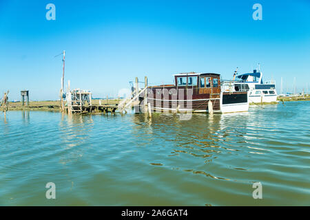 High tide, flooding near woodup pool, boats and yachts in the sea, fishing vessels Stock Photo