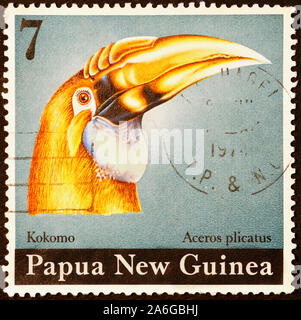 Hornbill head on postage stamp of Papua New Guinea Stock Photo