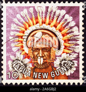 Indigenous of Papua New Guinea on postage stamp Stock Photo