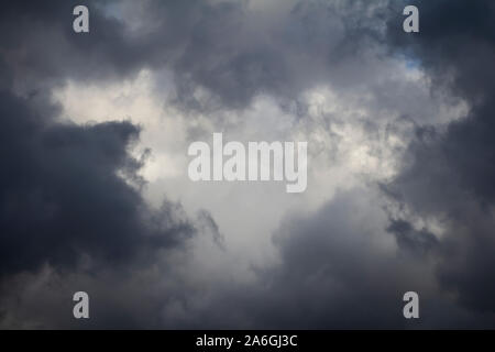 dark grey storm clouds on dramatic sky Stock Photo