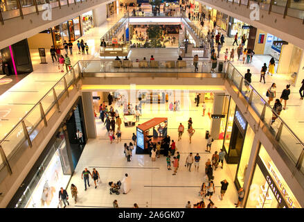 Dubai / UAE - October 19, 2019: World's largest shopping center. Crowd in Dubai Mall. Shoppers in Dubai Mall. Top vew. Stock Photo