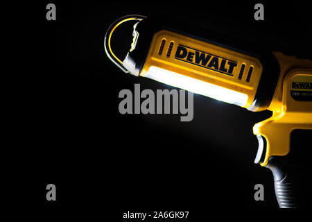 Dewalt cordless 18v LED flashlight, black background, battery operated Stock Photo