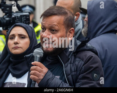 London, UK. 26th October 2019. Members of The United Families and Friends Campaign (UFFC), a coalition of of people killed by police, in prisons, in immigration detention and in secure psychiatric hospitals  speak at the rally on Whitehall opposite Downing St. Although thousands have died under suspicious circumstances since 1990, not one of those responsible have been convicted of murder or manslaughter. Peter Marshall/Alamy Live News Stock Photo