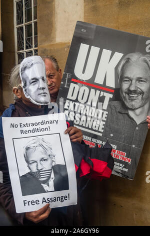 London, UK. 26th October 2019. Protesters called on the BBC to report the facts about Julian Assange and called for his extradition trial to be dropped as the political offences he is charged with by the US are specifically excluded by the US-UK Extradition treaty. They are appalled by his treatment in Belmarsh prison which have clearly affected his mental health, and feel that his recent court appearance was dictated by US personnel present in the court, and feel the attempt to hold his next court appearance at Belmarsh which only has room for 5 members of the public is a denial of justice. P Stock Photo