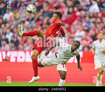 Munich, Germany. 26th Oct, 2019. Football FC Bayern Munich - FC Union Berlin, Munich October 26, 2019. Corentin TOLISSO, FCB 24  compete for the ball, tackling, duel, header, zweikampf, action, fight against Anthony UJAH, Union Berlin 11  FC BAYERN MUNICH - FC UNION BERLIN  - DFL REGULATIONS PROHIBIT ANY USE OF PHOTOGRAPHS as IMAGE SEQUENCES and/or QUASI-VIDEO -  1. Credit: Peter Schatz/Alamy Live News Stock Photo