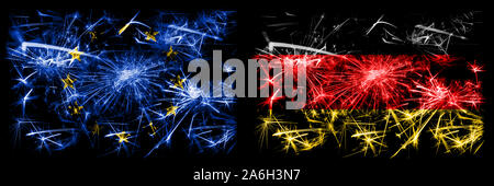 Eu, European union vs Germany, German new year celebration sparkling fireworks flags concept background. Combination of two states flags. Stock Photo