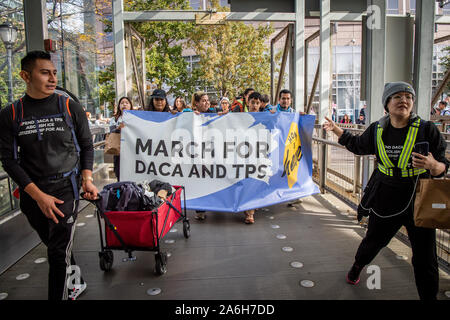 New York, USA. 26th Oct, 2019. A coalition of immigrant rights groups enters the ferry terminal on its journey to Washington, DC, to defend DACA and TPS on October 26, 2019, in New York City. (Photo by Gabriele Holtermann-Gorden/Pacific Press) Credit: Pacific Press Agency/Alamy Live News Stock Photo