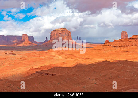 Shade and Sun in a Desert Panorama in Monument Valley Tribal Park in Arizona Stock Photo