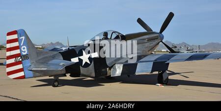 Tucson, USA - March 2, 2018: A vintage World War II-era P-51 Mustang fighter plane on the runway at Davis-Monthan Air Force Base in Tucson, Arizona. Stock Photo