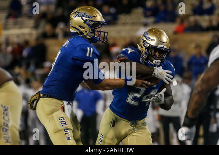 Tulsa, OK, USA. 26th Oct, 2019. Tulsa Quarterback ZACH SMITH (11) hands the ball off to Running Back COREY TAYLOR (24) during the Tulsa vs Memphis game on Oct 26th, 2019 at H.A Chapman Stadium in Tulsa, OK. Credit: Shane Cossey/ZUMA Wire/Alamy Live News Stock Photo