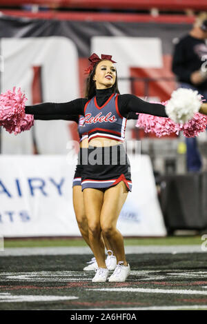 Las Vegas, NV, USA. 26th Oct, 2019. A UNLV Rebels cheerleader performs for the crowd prior to the start of the NCAA Football game featuring the San Diego State Aztecs and the UNLV Rebels at Sam Boyd Stadium in Las Vegas, NV. Christopher Trim/CSM/Alamy Live News Stock Photo
