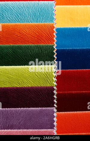 Masterly bright contrast colourful fabric samples close-up. Stock Photo