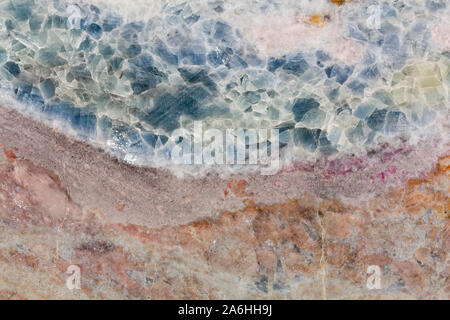 Close up of rad and blue marble texture. background. Stock Photo
