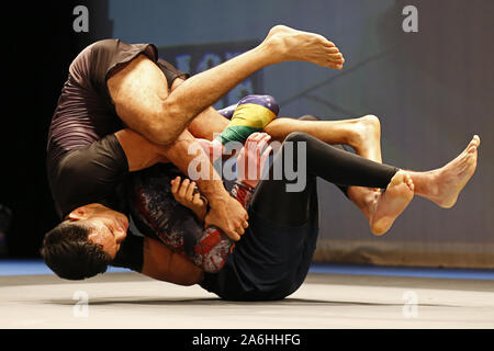 Westbury, New York, USA. 26th Oct, 2019. BILL ALGEO fights against PHILLIPE NOVER (top) during the RISE Invitational grappling event at the Space in Westbury, New York. Credit: Anna Sergeeva/ZUMA Wire/Alamy Live News Stock Photo