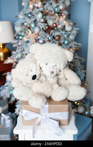 Christmas mood, Two white toy teddy bears against the background