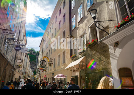 The Getreidegasse , famous shopping street in Salzburg’s Old City, Mozart’s Birthplace , irresistible destination for visitors from around the world. Stock Photo