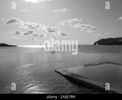 Devil’s Point swimming bath on the seafront in Stonehouse, Plymouth. A sea water pool empty and surreal.Black and White. Stock Photo
