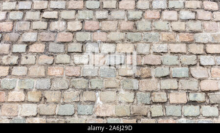 Gray color stones structure, stonewall building facade background, texture Stock Photo