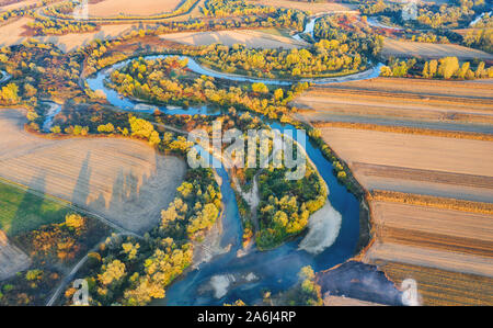 Aerial view of river shape during autumn Stock Photo