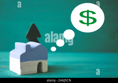 House and tree on green background Stock Photo