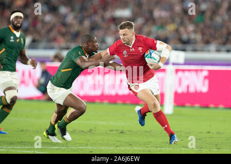 Yokohama, Japan. 27th Oct, 2019. Dan Biggar of Wales hands off Makazole Mapimpi of South Africa during the Rugby World Cup semi-final match between Wales and South Africa in Kanagawa Prefecture, Japan, on October 27, 2019 Credit: European Sports Photographic Agency/Alamy Live News Stock Photo