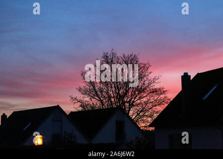 Beautiful sunset from the window of the house Stock Photo