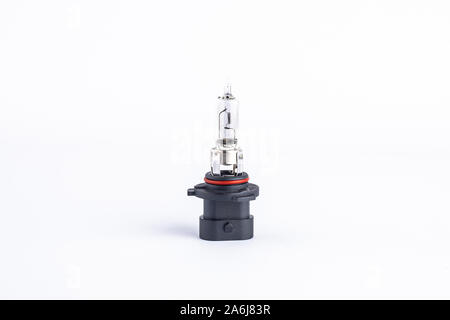 H13 type halogen lightning bulb for car headlights. Automotive electric spare part. Stock Photo