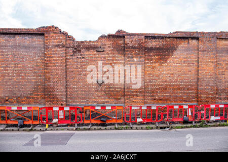 Crewe Works build trains behind those walls, soon to be demolished and making space for Coppenhall Place housing estate, Cheshire UK Stock Photo