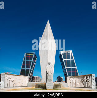 Madrid, Spain - Oct 26, 2019: Puerta De Europa towers as viewed from Plaza de Castilla in Madrid, Spain with Monumento a Jose Calvo Sotelo in foregrou Stock Photo