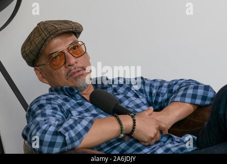 Berlin, Germany. 19th June, 2019. Joey Santiago, guitarist of the US-American band Pixies, speaks during an interview. Credit: Paul Zinken/dpa/Alamy Live News Stock Photo