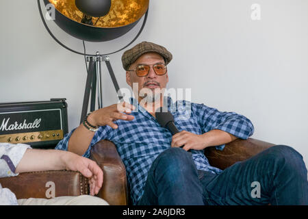 Berlin, Germany. 19th June, 2019. Joey Santiago, guitarist of the US-American band Pixies, speaks during an interview. Credit: Paul Zinken/dpa/Alamy Live News Stock Photo