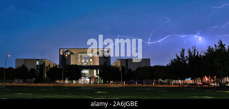 Berlin, Germany. 11th June, 2019. Thunderstorms can be seen above the Federal Chancellery in the evening. Credit: Paul Zinken/dpa/Alamy Live News Stock Photo