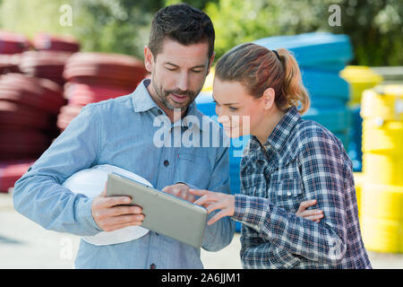 construction tubing supplier showing examples to the engineer Stock Photo