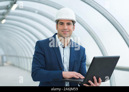 portrait of an architect engineer using laptop Stock Photo