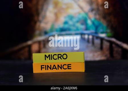 Micro Finance on the sticky notes with bokeh background Stock Photo