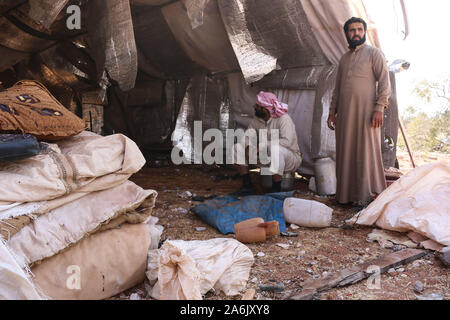 Barisha, Syria. 27th Oct, 2019. Syrians inspect their tent following an alleged US-led raid at the northwestern Syrian village of Barisha in the province of Idlib near the border with Turkey, after media reports said Islamic State (IS) leader Abu Bakr al-Baghdadi was believed to be killed in a US Special Forces raid on the outskirts of Barisha. Credit: Mustafa Dahnon/dpa/Alamy Live News Stock Photo