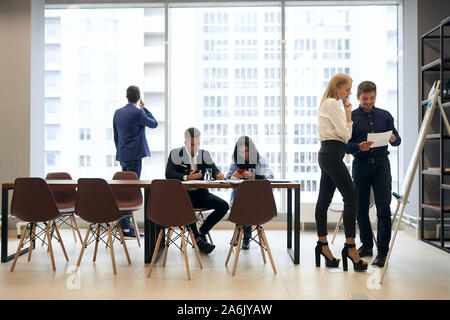 Group of busy successful business people working in office, lifestyle, work, job,profession. copy space. employees having a break during meeting, free Stock Photo