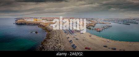 Aerial panoramic view of fishing village of Peniche on the Portuguese coast with former prison fortress Stock Photo