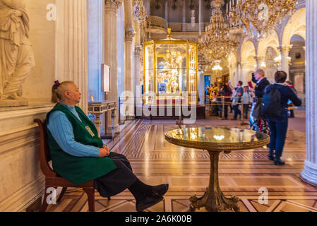 Old custodian in the Winter Palace in the State Hermitage Museum in St Petersburg, Russia