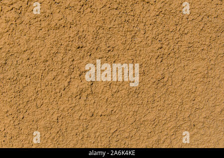 Texture of decorative plaster with a relief. Relief volume plaster on the wall of the building Stock Photo