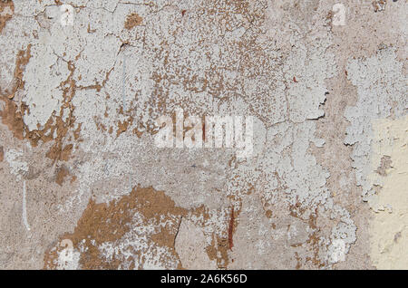 Texture of the old wall with peeling paint, plaster with cracks. Texture backround Stock Photo