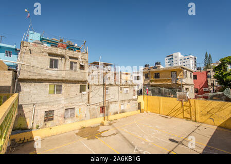 Santo Domingo, La Altagracia / Dominican Republic - April 11 2014: Sad Looking School Yard in Poor Neighbourhood La Yuca Stock Photo