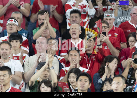 Kanagawa, Japan. 27th Oct, 2019. Supporters of Wales cheer before starting the Rugby World Cup 2019 Semi-Final 2 between Wales and South Africa at International Stadium Yokohama, near to Tokyo. South Africa defeats Wales 19-16. Credit: Rodrigo Reyes Marin/ZUMA Wire/Alamy Live News Stock Photo