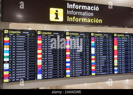 Barcelona Spain,Catalonia Barcelona-El Prat Josep Tarradellas Airport BCN,terminal,arrivals board,flight information,multiple languages,sign,English C Stock Photo