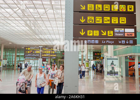 Barcelona Spain,Catalonia Catalunya,Barcelona-El Prat Josep Tarradellas Airport BCN,terminal,sign,international ISO graphical symbols,directions,man m Stock Photo