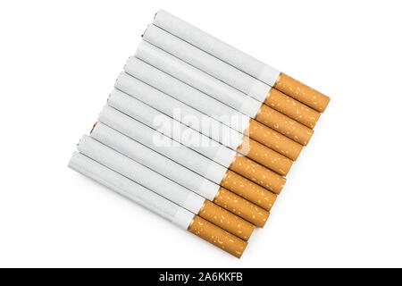 Ten tobacco cigarettes in a row isolated on white background with clipping  path. Top view. When smoking ten cigarettes or less per day, the risk Stock  Photo