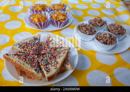 A party spread of Fairy Bread, Honey Joys and Chocolate Crackles Stock Photo