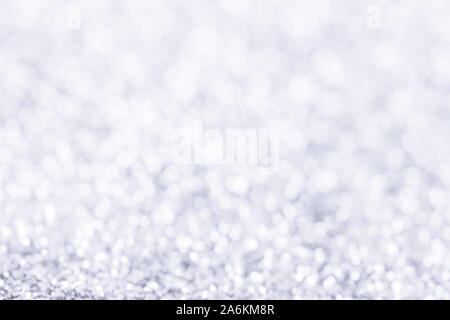 Abstract winter Christmas light blue background with bokeh. Defocused sparkle snow Stock Photo